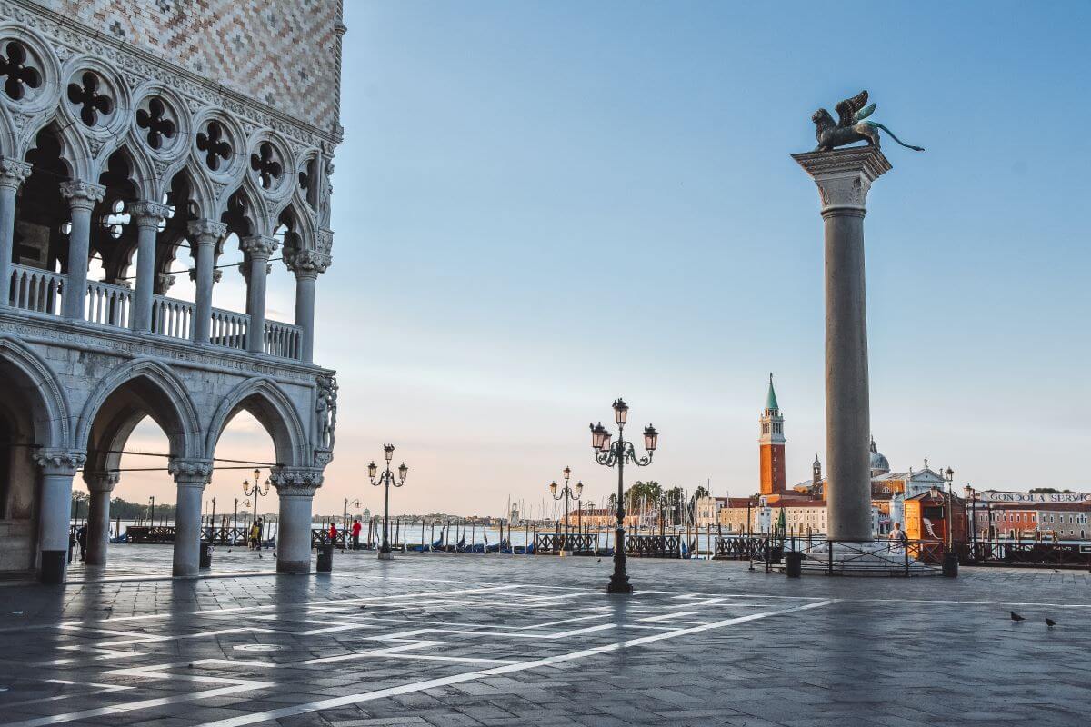 things to do in Venice: A visit to Piazzetta San Marco with two columns (with statues of St Theodore) and the lions of St Mark is a must when in Venice. This central meeting place for both locals and tourists runs vertically between the Piazza San Marco and the waterfront of St Mark`s Basin. Besides, the piazza, with two granite columns in front of the lagoon, offers magnificent views of the nearby Isola di San Giorgio Maggiore.
