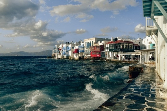 what to do in Mykonos: A visit to Little Venice is another popular things to do in Mykonos, because it is charming neighbourhood in Mykonos town. An elegant housing district named “Little Venice” has got its name due to similarity with Italy`s Venice.  A scenic area on the western part of the town has a row of buildings with colourful balconies directly on the Aegean Sea edge.