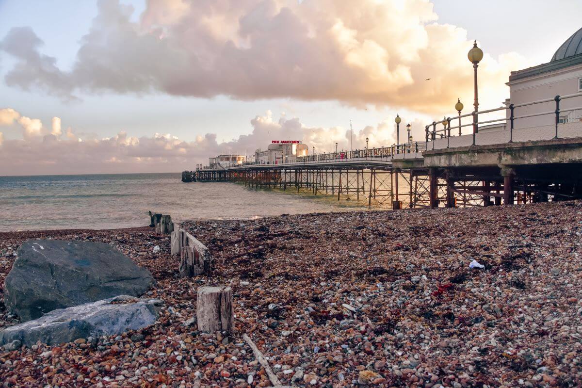 things to do in Worthing: Visiting Worthing Pier is one of the best things to do in Worthing in West Sussex because it is perfect for a promenade above the waves. Also, you can relax in the deckchairs and watch waves rolling into rocky shores. 