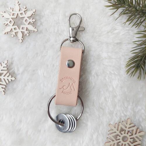gifts for travellers: A leather travel keyring is one of the best gifts for travellers because it is a perfect way to remember your travels. Therefore, Travel Charms are a must-have travel souvenir and unique Christmas gift.
