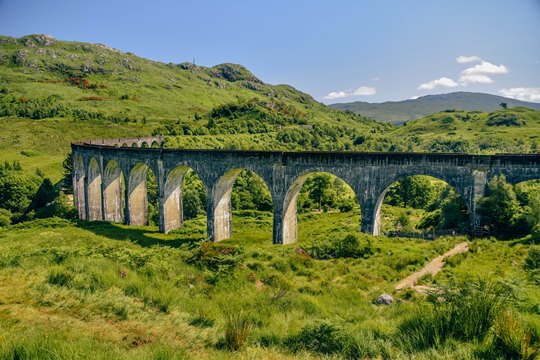 best places to visit in Scotland: No trip to Scotland for Harry Potter fans would be complete without visiting the Glenfinnan Viaduct. This impressive viaduct is one of the best places to visit in Scotland because Glenfinnan Viaduct gained its fame from Harry Potter movies. Yes, that is right, Glenfinnan Viaduct is famous as the "Harry Potter bridge". What's more, the Glenfinnan Viaduct was the first structure built with mass concrete.
