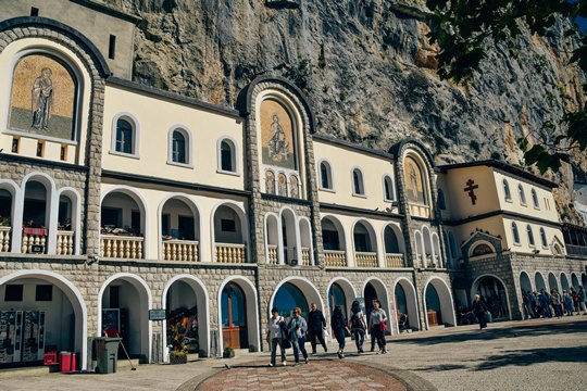 places to visit in Montenegro: Ostrog Monastery houses the remains of its founder, who became a saint after his death. It's also the most important Orthodox site in the country, and, therefore, Ostrog Monastery is one of the most popular places to visit in Montenegro.