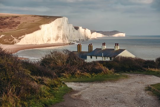 places to visit in East Sussex: Cuckmere Haven is one of the best places to visit in East Sussex because it is one of the best spots to enjoy views of the iconic Seven Sisters cliffs. Cuckmere Haven is also a part of Seaford Nature Reserve, which has a rich ecosystem. 