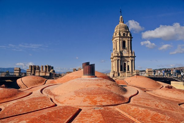 top things to do in Malaga: Malaga Cathedral's rooftop offers the best views in Malaga. From here, you can see the harbour and other landmarks in the city, such as the Alcazaba and Gibralfaro castle. Because of that, climbing steps to the rooftop of Malaga Cathedral is one of the top things to do in Malaga.